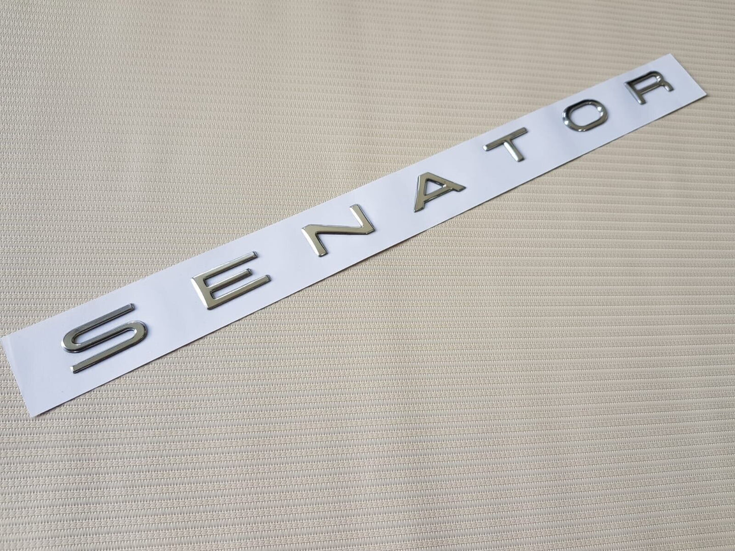2 X Chrome Senator Badge and 2 X HSV chrome Script Badge VE  VF Senator.