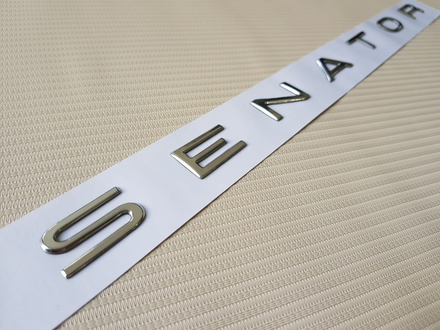 2 X Chrome Senator Badge and 2 X HSV chrome Script Badge VE  VF Senator.